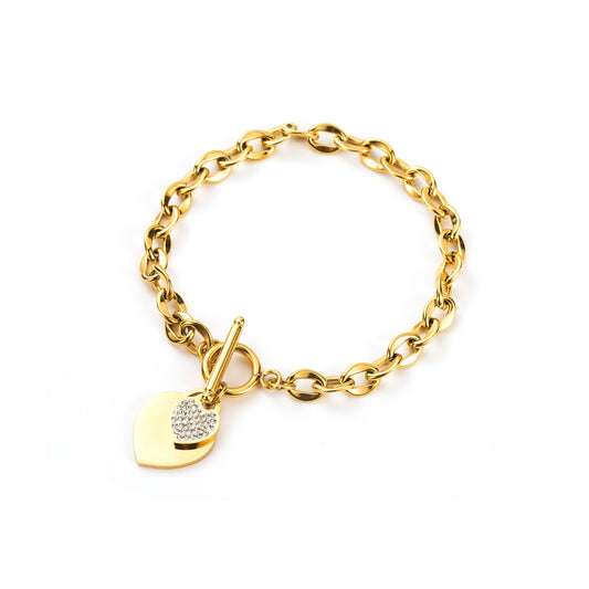 Bracelet avec fermoir et breloque coeur et strass